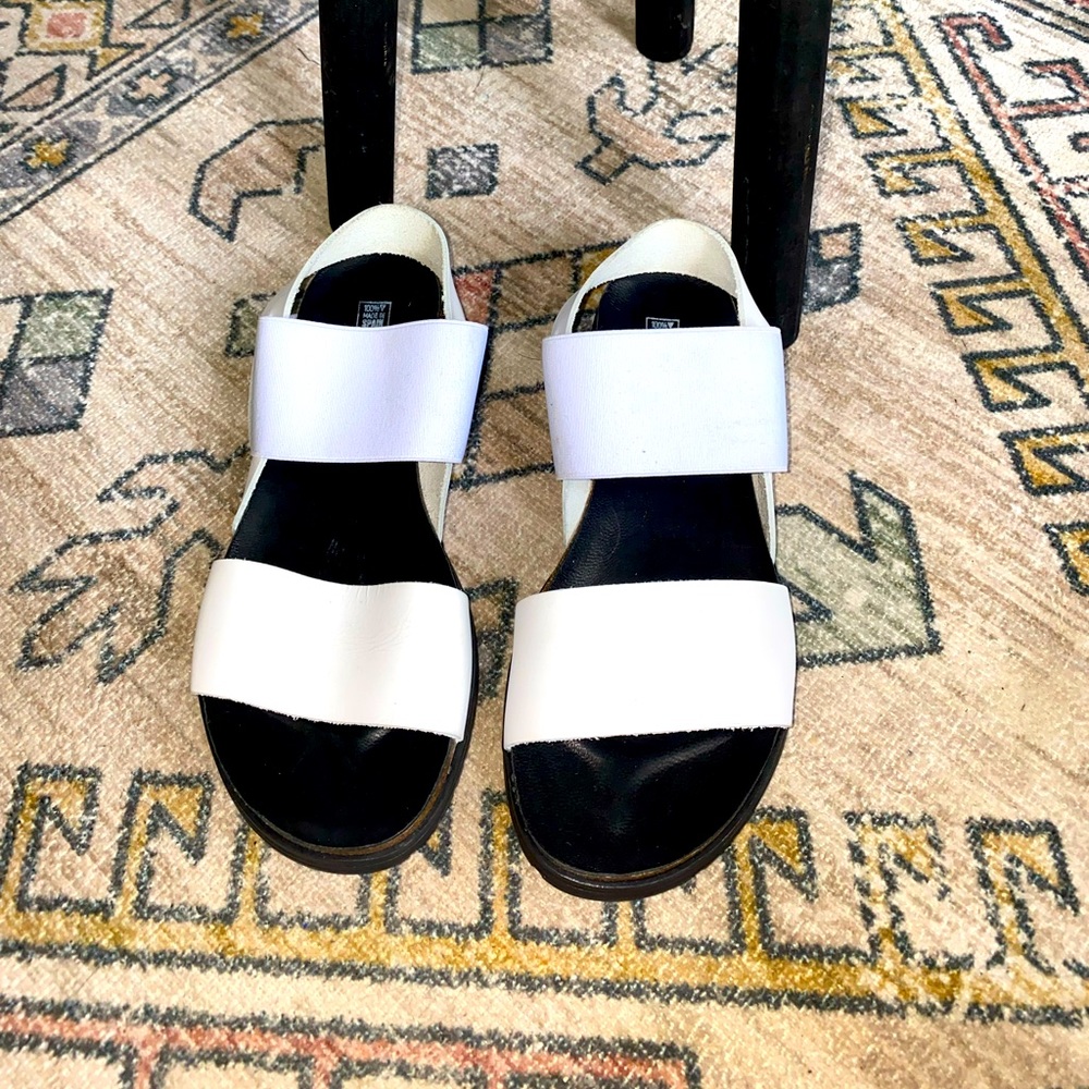 Brand new never worn Verbana sandals. White leather and elastic material.